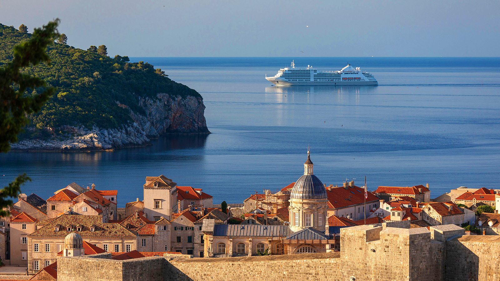 White and blue buildings overlooking the sea